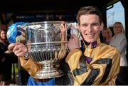 28 April 2015; Jockey Danny Mullins lifts The Blessington Cup after victory in the BoyleSports Champion Steeplechase on Felix Yonger. Punchestown Racecourse, Punchestown, Co. Kildare. Picture credit: Matt Browne / SPORTSFILE