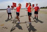 26 May 2008; Budweiser Beach Tag Festivals are just around the corner - Beach Tag festivals take place at Dingle, Co. Kerry, June 7th, Clifden, Co. Galway, June 21st, Clonakilty, Co. Cork, July 5th, and Courtown, Co. Wexford, July 7th. To register your team log on to www.irfutag.ie. Pictured at the Budweiser Beach Tag Rugby photocall are Luke Woods, left, Tim Mason with models Aoife Coogan, left, and Faith Barnett. Sandymount Beach, Dublin. Photo by Sportsfile