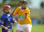 27 May 2008; Clodagh Tooher from Ballyboy NS, Offaly, in action against Stephanie Bergin, Durrow, Co.Laois, pictured participating in the Vhi Cúl Camps game played during half time. Leinster Senior Hurling Championship Quarter-Final, Dublin v Westmeath. Picture credit: David Maher / SPORTSFILE