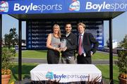 24 May 2008; Jason Pollard, owner of Bricks And Porter and trainer Charlie Swan receives the Boylesports Fon-A-Bet 1800440000 Handicap trophy from Aisling Fennin from Boylesports. The Curragh Racecourse, Co. Kildare. Picture credit: Matt Browne / SPORTSFILE