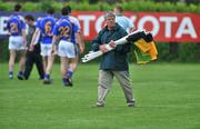 25 May 2008; A steward collects flags after the match. GAA Football Munster Senior Championship Quarter-Final, Limerick v Tipperary, Fitzgerald Park, Fermoy, Co. Cork. Picture credit: Brian Lawless / SPORTSFILE