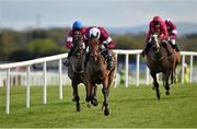 28 April 2015; Valseur Lido, with Ruby Walsh up, leads Wounded Warrior, left, with Paul Townend up, who finished second, and Apache Stronghold, with Paul Carberry up, who finished third, on their way to winning the Growise Champion Novice Steeplechase. Punchestown Racecourse, Punchestown, Co. Kildare. Picture credit: Matt Browne / SPORTSFILE