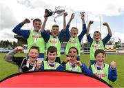 29 April 2015; Paul Walsh, captain of St Patrick's Boys NS, Castlebar, Co. Mayo, celebrates with team-mates and the cup after winning the Boys section C Final. SPAR FAI Primary School 5's Connacht Finals. Milebush Park, Castlebar, Mayo. Picture credit: Diarmuid Greene / SPORTSFILE