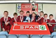 29 April 2015; Conor Egan, St Joseph's NS, Bolybeg, Co. Galway, lifts the cup along with team-mates after winning the Boys section A Final. SPAR FAI Primary School 5's Connacht Finals. Milebush Park, Castlebar, Mayo. Picture credit: Diarmuid Greene / SPORTSFILE