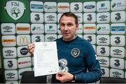29 April 2015; Republic of Ireland head coach Tom Mohan, with the full squad list, following the squad announcement. Maldron Hotel, Dublin Airport, Dublin. Picture credit: Stephen McCarthy / SPORTSFILE