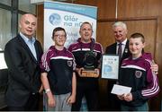 26 April 2015; Uachtarán Chumann Lúthchleas Gael Aogán Ó Fearghail and Pádraig Ó Ciardha, Cathaoirleach Glór na nGael, left, present Lúcás Uada, Daragh Mac Craith, Séimí Mac Craith and Seán Uada, Cumann Lúthchleas Gael An Ghaeltacht, Waterford, with a Turas Teanga 2014 Certificate and trophy as overall winners at Comórtas na nGael function in Croke Park, Dublin. Picture credit: Ray McManus / SPORTSFILE