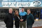 29 April 2015; DCU GAA star Michael Quinn, Longford, is recognised on his recent Sigerson Cup All-Star award by Bank of Ireland's DCU Branch manager Eithne Connolly, DCU Sigerson Cup team manager Professor Niall Moyna, Monaghan, right, and DCU GAA Academy Director Michael Kennedy, Tyrone. DCU, Glasnevin, Dublin. Picture credit: Stephen McCarthy / SPORTSFILE