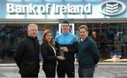 29 April 2015; DCU GAA star Tadhg Lowe, Roscommon, is recognised on his recent Sigerson Cup All-Star award by Bank of Ireland's DCU Branch manager Eithne Connolly, DCU Sigerson Cup team manager Professor Niall Moyna, Monaghan, right, and DCU GAA Academy Director Michael Kennedy, Tyrone. DCU, Glasnevin, Dublin. Picture credit: Stephen McCarthy / SPORTSFILE