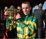 30 April 2015; Jockey Mark Walsh with the Ladbrokes World Series Hurdle Cup after victory on Jezki. Punchestown Racecourse, Punchestown, Co. Kildare. Picture credit: Matt Browne / SPORTSFILE