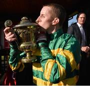 30 April 2015; Jockey Mark Walsh with the Ladbrokes World Series Hurdle Cup after victory on Jezki. Punchestown Racecourse, Punchestown, Co. Kildare. Picture credit: Matt Browne / SPORTSFILE