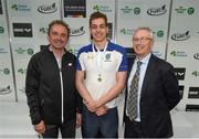 30 April 2015; Alex Murphy, UCD, who won the men's 50m breaststroke final, in a time of 27.56, and also qualified for the World Swimming Championship, is presented with his medal by Stephen Martin, Chief Executive Olympic Council of Ireland, left, and John Treacy, CEO of the Irish Sports Council, right, during the 2015 Irish Open Swimming Championships at the National Aquatic Centre, Abbotstown, Dublin. Picture credit: Stephen McCarthy / SPORTSFILE