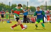 30 April 2015; Luke Meyer, left, Durrow NS, Durroy, Co. Offaly, in action against Isaac McKeever, Boyerstown NS, Boyerstown, Co. Meath. SPAR FAI Primary School 5s Leinster Final, MDL Grounds, Trim Road, Navan, Co. Meath. Picture credit: Brendan Moran / SPORTSFILE