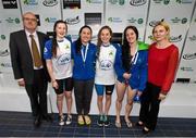 30 April 2015; Aer Lingus swimmers, from left, Hannah McMenamin, Aisling Haughey, Caitriona Finlay and Melanie Houghton who were presented with their women's 400m freestyle relay national championships silver medals by Swim Ireland CEO Sarah Keane and Paul McDermott, Irish Sports Council, Director of High Performance, NGB's & Communications, during the 2015 Irish Open Swimming Championships at the National Aquatic Centre, Abbotstown, Dublin. Picture credit: Stephen McCarthy / SPORTSFILE