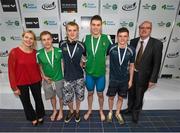 30 April 2015; Ards swimmers, from left, Cai Armstrong, James Brown, Curtis Coulter and Conor Munn who were presented with their Men's 400m freestyle relay national championships silver medals by Swim Ireland CEO Sarah Keane and Paul McDermott, Irish Sports Council, Director of High Performance, NGB's & Communications, during the 2015 Irish Open Swimming Championships at the National Aquatic Centre, Abbotstown, Dublin. Picture credit: Stephen McCarthy / SPORTSFILE