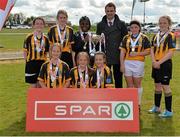 30 April 2015; St Brigid's NS, Kildare town, are presented with the cup by Keith Crawford, Leinster Retail Operation Advisor, SPAR, after winning the Girls Section B title. SPAR FAI Primary School 5s Leinster Final, MDL Grounds, Trim Road, Navan, Co. Meath. Picture credit: Brendan Moran / SPORTSFILE