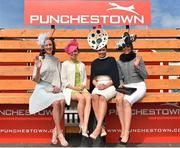 1 May 2015; Racegoers, from left, Grainne Dineen, Kerry, Grace Jeffries, Tipperary, Ellen O'Donnell, Tipperary, and her sister Una O'Donnell, Tipperary, take a break on a giant bench. Punchestown Racecourse, Punchestown, Co. Kildare. Picture creidt: Cody Glenn / SPORTSFILE