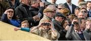 1 May 2015; Racegoers follow the action. Punchestown Racecourse, Punchestown, Co. Kildare. Picture credit: Cody Glenn / SPORTSFILE