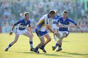 31 May 2008; James Stafford, Wicklow, in action against Kevin Meaney, 17, and John O'Loughlin, Laois. GAA Football Leinster Senior Championship Quarter-Final, Wicklow v Laois, Dr Cullen Park, Carlow. Picture credit: Matt Browne / SPORTSFILE