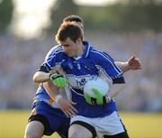 31 May 2008; Mark Timmons, Laois, is tackled by Seanie Furlong, Wicklow. GAA Football Leinster Senior Championship Quarter-Final, Wicklow v Laois, Dr Cullen Park, Carlow. Picture credit: Matt Browne / SPORTSFILE