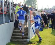 31 May 2008; Laois Pauric Clancy, left, makes his way into the stand to take his place on the bench after failing a late fitness test with team-mate Barry Brennan. GAA Football Leinster Senior Championship Quarter-Final, Wicklow v Laois, Dr Cullen Park, Carlow. Picture credit: Matt Browne / SPORTSFILE