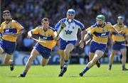 1 June 2008; Declan Prendergast, Waterford, in action against Tony Griffin, left, Brian O'Connell and Mark Flaherty, Clare. GAA Hurling Munster Senior Championship Quarter-Final, Waterford v Clare, Gaelic Grounds, Limerick. Picture credit: Brendan Moran / SPORTSFILE *** Local Caption ***