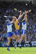 1 June 2008; Tony Griffin, Clare, contests a dropping ball with Declan Prendergast, left, and Tony Browne, Waterford. GAA Hurling Munster Senior Championship Quarter-Final, Waterford v Clare, Gaelic Grounds, Limerick. Picture credit: Brendan Moran / SPORTSFILE *** Local Caption ***