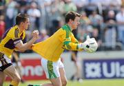 1 June 2008; Michael Ahern, Meath, is tackled by Adrian Flynn, Wexford. GAA Football Leinster Senior Championship Quarter-Final, Meath v Wexford, Dr. Cullen Park, Carlow. Picture credit: Matt Browne / SPORTSFILE