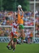 1 June 2008; Rory Kavanagh, Donegal, in action against Gerard O'Kane, Derry. GAA Football Ulster Senior Championship Quarter-Final, Donegal v Derry, MacCumhaill Park, Ballybofey, Co. Donegal. Picture credit: David Maher / SPORTSFILE