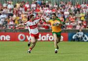 1 June 2008; Rory Kavanagh, Donegal, in action against Gerard O'Kane, Derry. GAA Football Ulster Senior Championship Quarter-Final, Donegal v Derry, MacCumhaill Park, Ballybofey, Co. Donegal. Picture credit: Oliver McVeigh / SPORTSFILE
