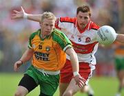 1 June 2008; Brian Roper, Donegal, in action against Gerard O'Kane, Derry. GAA Football Ulster Senior Championship Quarter-Final, Donegal v Derry, MacCumhaill Park, Ballybofey, Co. Donegal. Picture credit: David Maher / SPORTSFILE