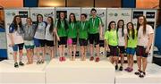 1 May 2015; Medal recipients from the women's 100m backstroke final, in the company of Anne McAdam, left, President of Swim Ireland, and Maev Nic Lochlainn, principal officer at the Department of Transport Tourism and Sport, from left, in second place Aer Lingus team of, Orla Walsh, Hannah McMenamin, Emma Kelly and Caitriona Finlay, in first place Ards team of Rebecca Reid, Mary-Kate McDowell, Emma Reid and Bethy Firth, and in third place Sunday's Well team of Ally Cunningham, Sharon Semchiy, Iseult Hayes and Emma Cassidy. 2015 Irish Open Swimming Championships at the National Aquatic Centre, Abbotstown, Dublin.  Picture credit: Piaras Ó Mídheach / SPORTSFILE