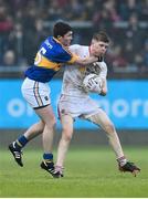 2 May 2015; Cathal McShane, Tyrone, is tackled by Ross Mulcahy, Tipperary. EirGrid GAA All-Ireland U21 Football Championship Final, Tipperary v Tyrone. Parnell Park, Dublin. Picture credit: Ramsey Cardy / SPORTSFILE