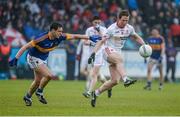 2 May 2015; Frank Burns, Tyrone, in action against Cathal Luke Bolland, Tipperary. EirGrid GAA All-Ireland U21 Football Championship Final, Tipperary v Tyrone. Parnell Park, Dublin. Picture credit: Oliver McVeigh / SPORTSFILE