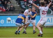 2 May 2015; Lee Brennan, Tyrone, in action against Luke Boland and Colm O'Shaughnessy, Tipperary. EirGrid GAA All-Ireland U21 Football Championship Final, Tipperary v Tyrone. Parnell Park, Dublin. Picture credit: Oliver McVeigh / SPORTSFILE