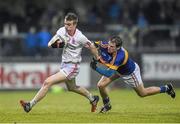 2 May 2015; Mark Kavanagh, Tyrone, is tackled by Bill Maher, Tipperary. EirGrid GAA All-Ireland U21 Football Championship Final, Tipperary v Tyrone. Parnell Park, Dublin. Picture credit: Ramsey Cardy / SPORTSFILE