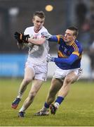 2 May 2015; Mark Kavanagh, Tyrone, is tackled by Ian Fahey, Tipperary. EirGrid GAA All-Ireland U21 Football Championship Final, Tipperary v Tyrone. Parnell Park, Dublin. Picture credit: Ramsey Cardy / SPORTSFILE