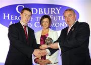 29 May 2008; Brian Fox, from Tipperary, is presented with a 2008 Cadbury Hero of the Future Award by GAA President Nickey Brennan, in the company of Audrey Buckley, Brand Manager, Cadbury Ireland. Brian was one of 13 shortlisted players, all nominees can be seen on www.cadburygaau21.com. Westin Hotel, Dublin. Picture credit: Ray McManus / SPORTSFILE