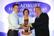 29 May 2008; Paul McComiskey, from Down, is presented with a 2008 Cadbury Hero of the Future Award by GAA President Nickey Brennan, in the company of Audrey Buckley, Brand Manager, Cadbury Ireland. Paul was one of 13 shortlisted players, all nominees can be seen on www.cadburygaau21.com. Westin Hotel, Dublin. Picture credit: Ray McManus / SPORTSFILE