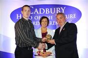 29 May 2008; Gavin Smullen, from Kildare, is presented with a 2008 Cadbury Hero of the Future Award by GAA President Nickey Brennan, in the company of Audrey Buckley, Brand Manager, Cadbury Ireland. Gavin was one of 13 shortlisted players, all nominees can be seen on www.cadburygaau21.com. Westin Hotel, Dublin. Picture credit: Ray McManus / SPORTSFILE