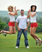 30 May 2008; Former Liverpool and Republic of Ireland player John Aldridge with models Jenny Lee Masterson, left, and Baiba Gaile at a photocall to launch Share Liverpool FC Ireland. The Share Liverpool FC initiative was formed in February 2008. The idea is to get 100,000 Liverpool fans to give 6,300euros / £5,000 each to help buy the club out. Citywest Hotel, Saggart, Co. Dublin. Picture credit: Brian Lawless / SPORTSFILE  *** Local Caption ***