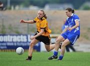 31 May 2008; Margaret O'Donoghue, Munster, in action against Neamh Woods, Ulster. Ladies Football Interprovincial Football tournament final, Munster v Ulster, Pairc Chiarain, Athlone, Co. Westmeath. Picture credit: Stephen McCarthy / SPORTSFILE  *** Local Caption *** 11    6