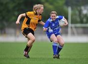 31 May 2008; Patrice Dennehy, Munster, in action against Neamh Woods, Ulster. Ladies Football Interprovincial Football tournament final, Munster v Ulster, Pairc Chiarain, Athlone, Co. Westmeath. Picture credit: Stephen McCarthy / SPORTSFILE  *** Local Caption *** 17    6