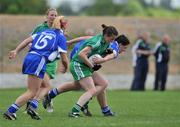 31 May 2008; Sinead Dooley, Leinster, is tackled by Michelle Rayn, Munster. Ladies Football Interprovincial Football tournament, Leinster v Munster, Pairc Chiarain, Athlone, Co. Westmeath. Picture credit: Stephen McCarthy / SPORTSFILE