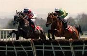 3 May 2000; Risk Accessor, with Charlie Swan up, right, and The Next Step, with Ruby Walsh up, jump the first during The Noel C. Ryan Memorial Novice Hurdle at Punchestown Racecourse in Kildare. Photo by Matt Browne/Sportsfile