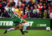 9 July 2000; Tommy Johnson of Celtic shoots to score his side's second goal under pressure from Jody Lynch of Bray Wanderers during the Pre-Season Friendly between Bray Wanderers and Celtic at the Carlisle Grounds in Bray, Wicklow. Photo by Ray Lohan/Sportsfile
