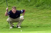 2 July 2000; Paddy Gribben of Ireland lines up a putt on the 2nd green during the fourth day of the 2000 Murphy's Irish Open at Ballybunion Golf Club in Kerry. Photo by Matt Browne/Sportsfile