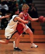 28 January 2000; Angie McNally of Tolka Rovers in action against Lisa Timmons of Meteors during the Senior Women's Sprite Cup Semi-Final between Tolka Rovers and Meteors at the National Basketball Arena in Tallaght, Dublin. Photo By Brendan Moran/Sportsfile