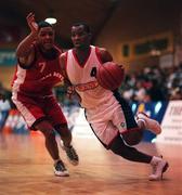 28 January 2000; Brian Benjamin of Denny Notre Dame in action against Joey Haastrup of Tolka Rovers during the Senior Men's Sprite Cup Semi-Final between Tolka Rovers and Denny Notre Dame at the National Basketball Arena in Tallaght, Dublin. Photo By Brendan Moran/Sportsfile