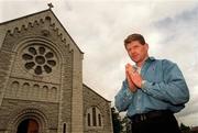 13 July 2000; Boxer Jim Rock poses for a portrait during a feature photo shoot outside St Annes Church in Shankill, Dublin. Photo by Matt Browne/Sportsfile