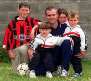 12 July 2000; Derek Swan pictured with childen, from left, Derek, aged 13, who plays soccer for Home Farm, Ryan, aged 4, Leah, aged 9, and Anthony, aged 3, during a feature photo shoot at their home in Johnstone Park, Dublin. Photo by Matt Browne/Sportsfile